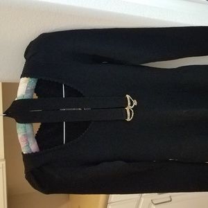 Black evening dress with belt.